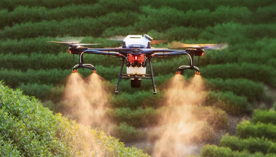 DJI spraying drone in Auburn